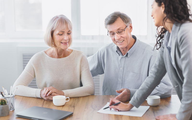 Couple Talking To Financial Expert