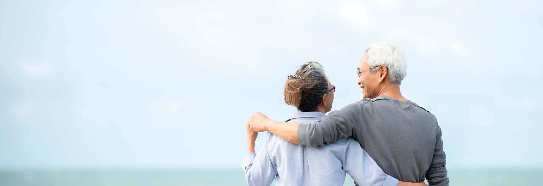 Elderly Couple By Water